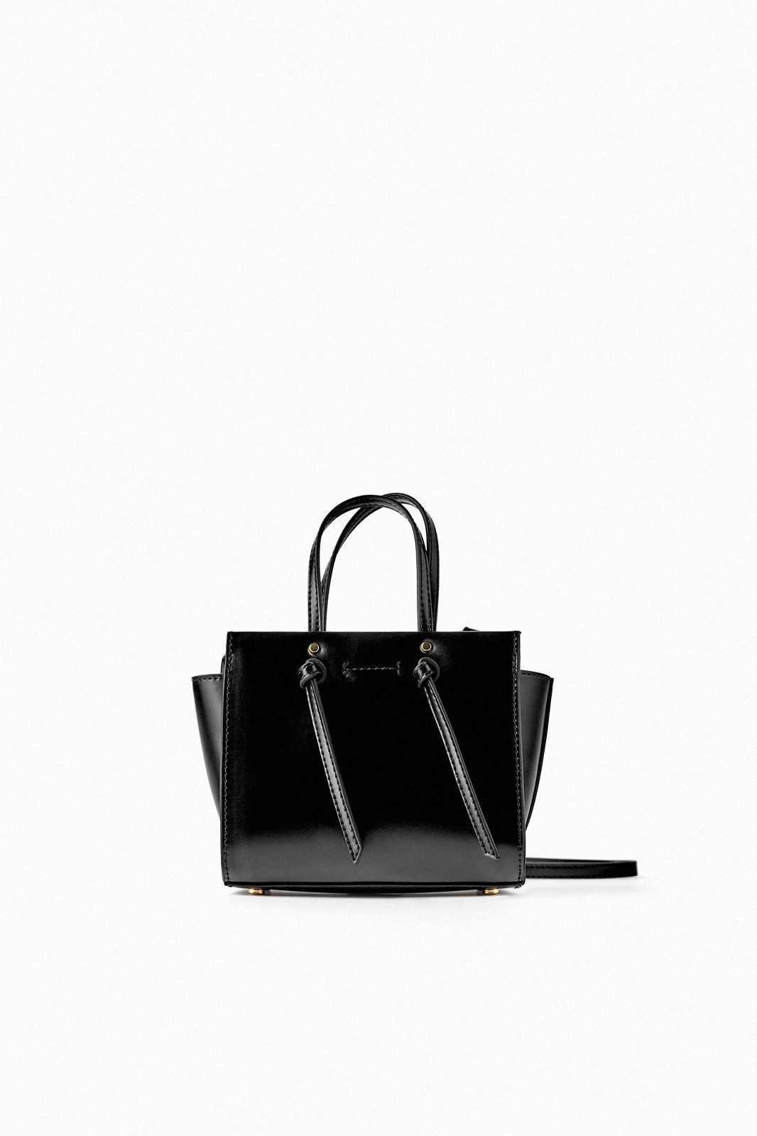 Elegant Black Handbag with Zip Comparment